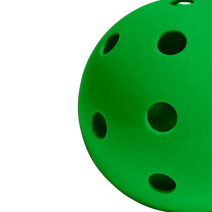 Perforated Surface of Green Pickleball Against a White Background 